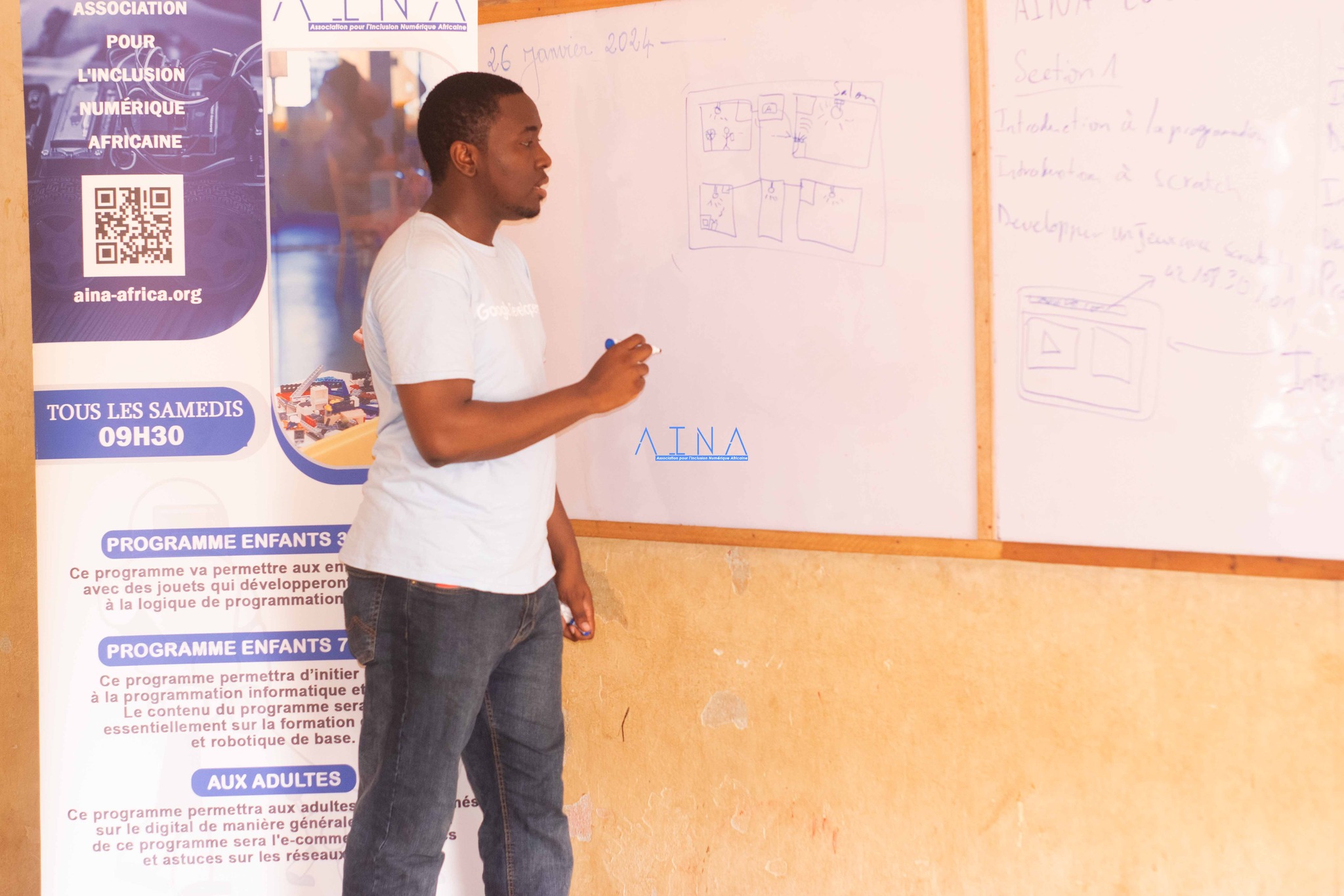 Trainer at whiteboard